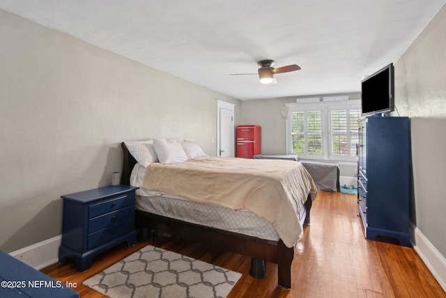 2541 Grand St, Jacksonville, FL 32208 - bedroom with baseboards, a ceiling fan, and wood finished floors