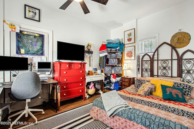 bedroom featuring ceiling fan and wood finished floors