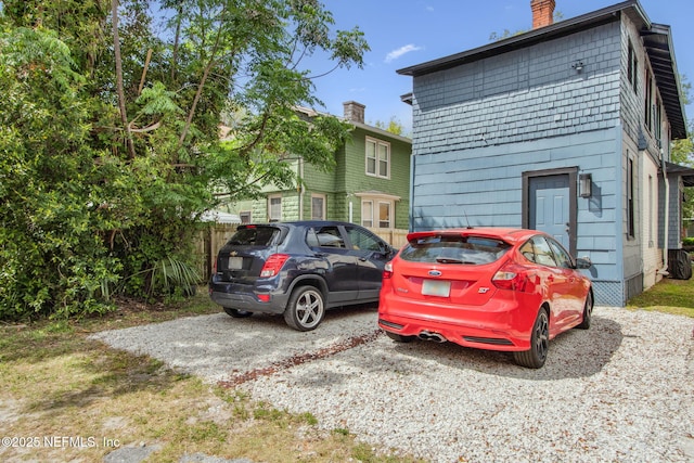 exterior space featuring a chimney