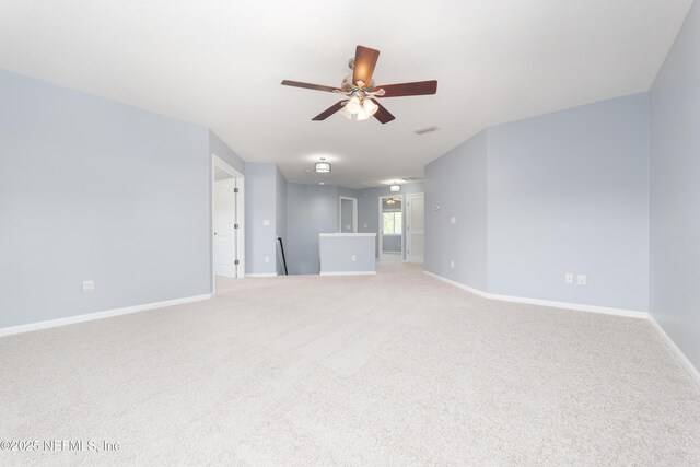 476 Monet Ave, Ponte Vedra, FL 32081 - unfurnished living room featuring baseboards, visible vents, light colored carpet, and ceiling fan