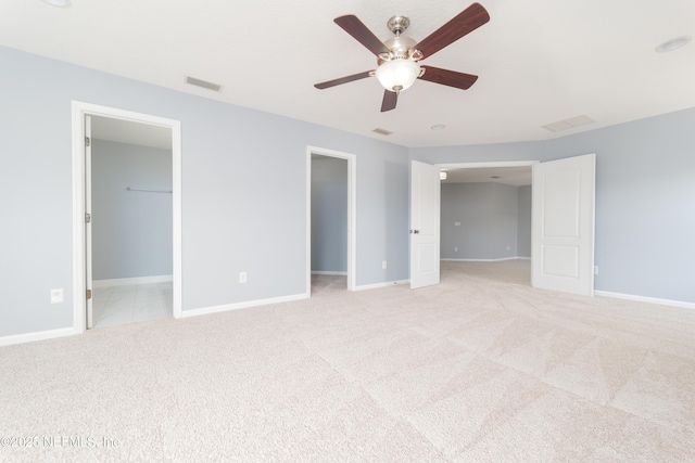 476 Monet Ave, Ponte Vedra, FL 32081 - unfurnished bedroom featuring visible vents, baseboards, ceiling fan, light carpet, and a spacious closet