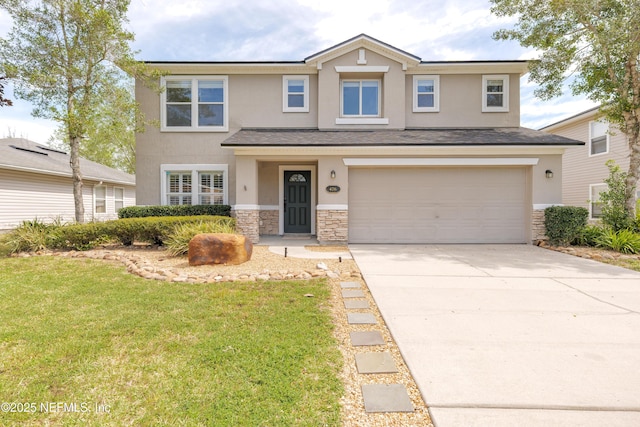 476 Monet Ave, Ponte Vedra, FL 32081 - view of front facade with stone siding, an attached garage, concrete driveway, a front lawn, and stucco siding