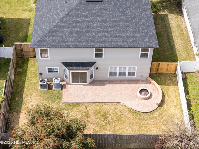 476 Monet Ave, Ponte Vedra, FL 32081 - rear view of house featuring a lawn, a fire pit, a fenced backyard, and a patio area