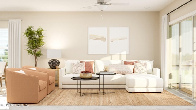 living area with a ceiling fan