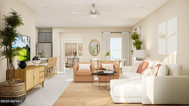 living area with ceiling fan