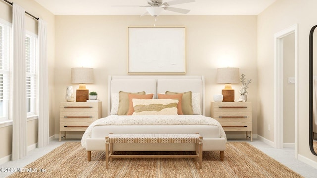 bedroom featuring baseboards, carpet flooring, and ceiling fan
