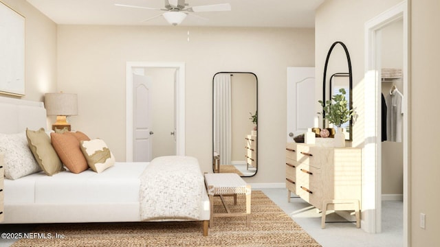 bedroom featuring baseboards, ceiling fan, and carpet flooring