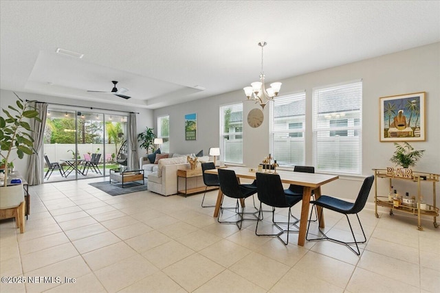 55 Cool Springs Ave, Ponte Vedra, FL 32081 - dining area featuring light tile patterned flooring, a textured ceiling, and a tray ceiling