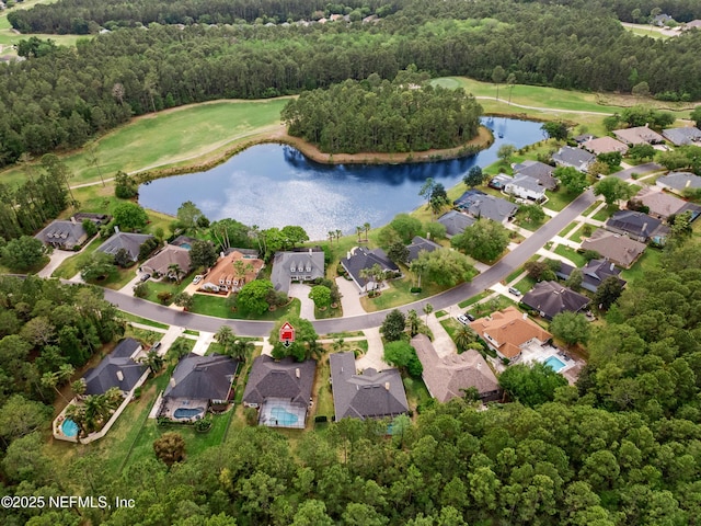 drone / aerial view with a residential view and a water view