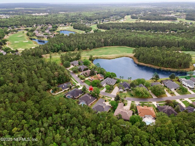 birds eye view of property featuring a water view and a residential view