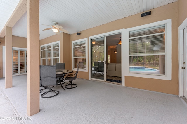 view of patio / terrace with outdoor dining space and a ceiling fan