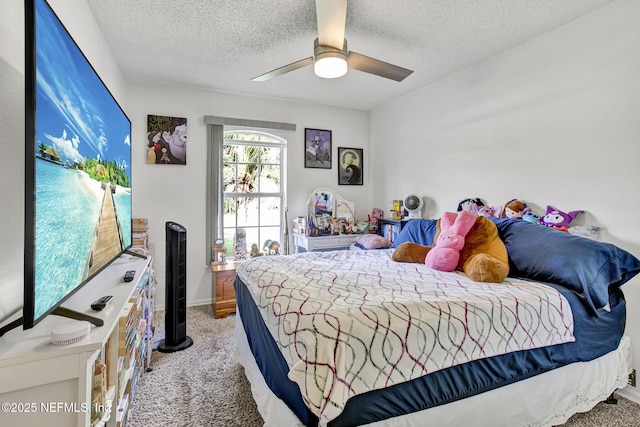 2682 Kimberly Forest Dr E, Jacksonville, FL 32246 - bedroom with a textured ceiling, ceiling fan, carpet flooring, and baseboards