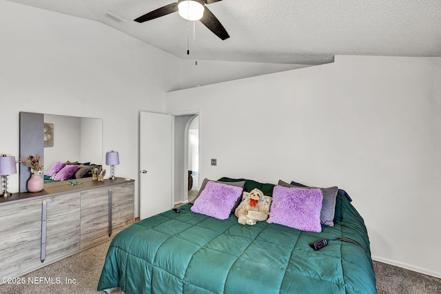2682 Kimberly Forest Dr E, Jacksonville, FL 32246 - carpeted bedroom with a ceiling fan, visible vents, vaulted ceiling, and arched walkways