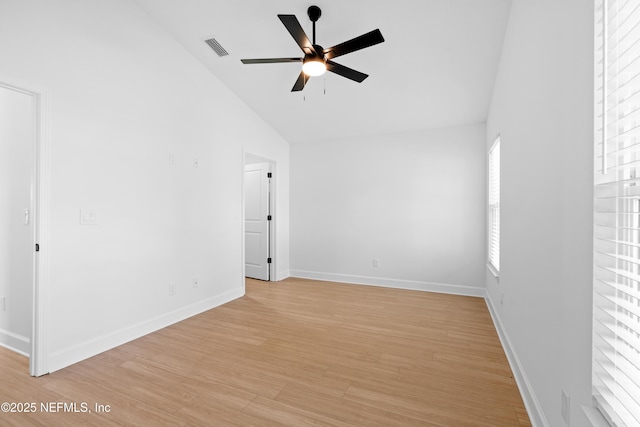 65 Josiah St, Saint Augustine, FL 32084 - unfurnished room with high vaulted ceiling, baseboards, ceiling fan, light wood-style flooring, and visible vents
