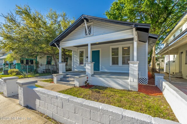 1539 7th St W, Jacksonville, FL 32209 - view of front facade with covered porch and fence