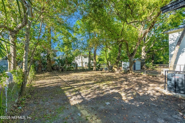 1539 7th St W, Jacksonville, FL 32209 - view of yard featuring fence and central AC unit