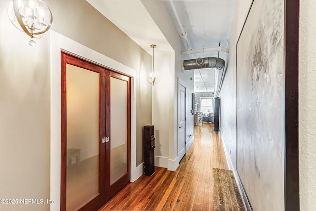 301 E Bay St Unit 405, Jacksonville, FL 32202 - corridor featuring dark wood-style flooring