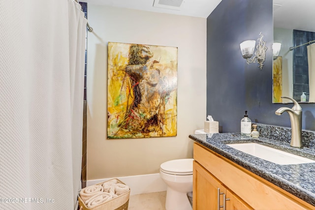 301 E Bay St Unit 405, Jacksonville, FL 32202 - bathroom with visible vents, baseboards, toilet, vanity, and tile patterned flooring