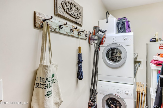 301 E Bay St Unit 405, Jacksonville, FL 32202 - washroom featuring stacked washer and dryer and laundry area
