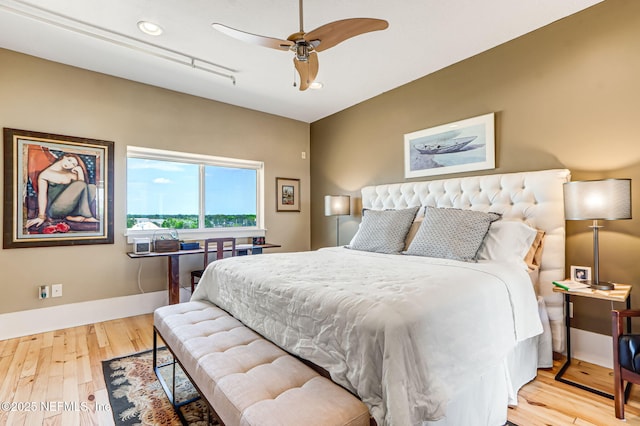 301 E Bay St Unit 405, Jacksonville, FL 32202 - bedroom featuring baseboards, recessed lighting, wood finished floors, and a ceiling fan
