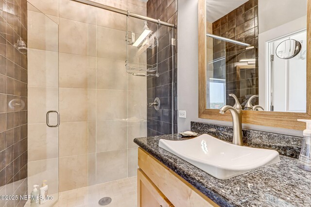 301 E Bay St Unit 405, Jacksonville, FL 32202 - full bathroom featuring a shower stall and vanity