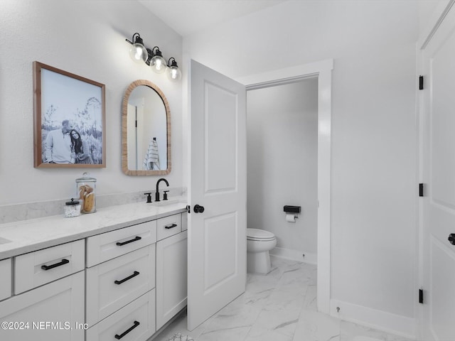 431 Crestview Dr, Ponte Vedra, FL 32081 - bathroom with toilet, a sink, marble finish floor, baseboards, and double vanity