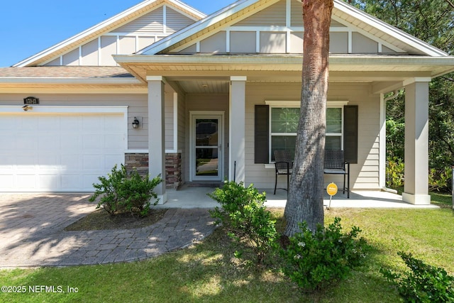 15943 Baxter Creek Dr, Jacksonville, FL 32218 - craftsman inspired home featuring driveway, stone siding, a porch, and a garage