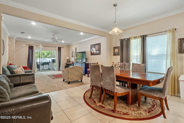 15943 Baxter Creek Dr, Jacksonville, FL 32218 - dining area featuring light tile patterned flooring, ornamental molding, recessed lighting, and ceiling fan