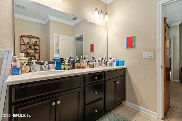 15943 Baxter Creek Dr, Jacksonville, FL 32218 - bathroom with tile patterned flooring, a sink, ornamental molding, and visible vents