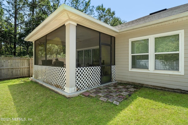 15943 Baxter Creek Dr, Jacksonville, FL 32218 - exterior space with a lawn, a sunroom, and fence