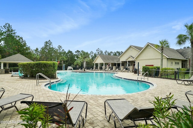 15943 Baxter Creek Dr, Jacksonville, FL 32218 - pool featuring fence and a patio area