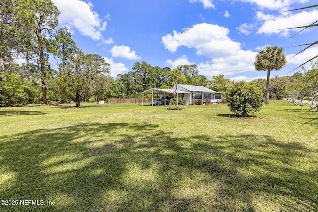 view of yard featuring a carport