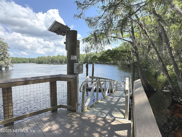 view of dock with a water view