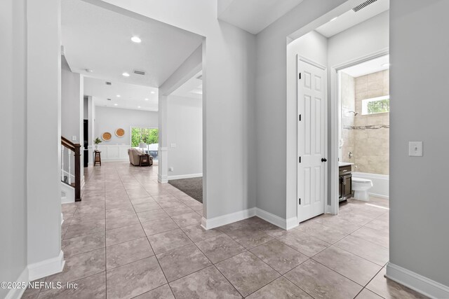 185 Calumet Dr, Saint Johns, FL 32259 - corridor featuring light tile patterned floors, visible vents, baseboards, and recessed lighting