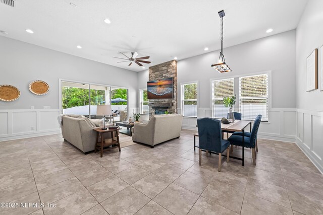 185 Calumet Dr, Saint Johns, FL 32259 - dining area with ceiling fan, a decorative wall, and a healthy amount of sunlight