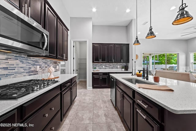185 Calumet Dr, Saint Johns, FL 32259 - kitchen featuring decorative light fixtures, light tile patterned flooring, light stone counters, visible vents, and appliances with stainless steel finishes