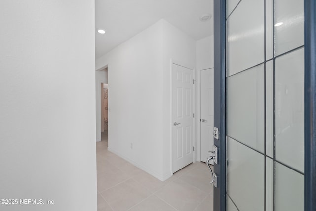 102 Fairlake Cir, Saint Augustine, FL 32092 - hall featuring baseboards, recessed lighting, and light tile patterned flooring