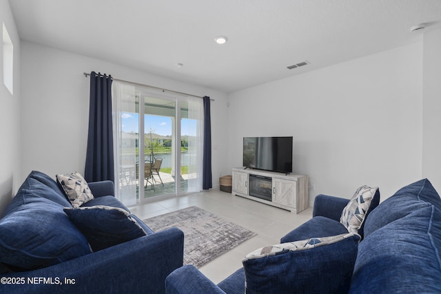 102 Fairlake Cir, Saint Augustine, FL 32092 - tiled living room featuring visible vents