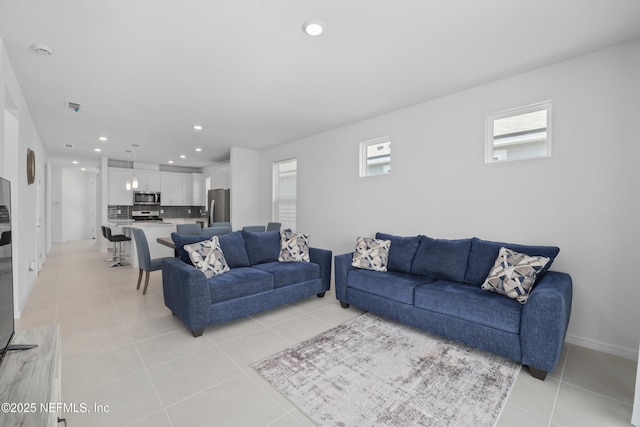 102 Fairlake Cir, Saint Augustine, FL 32092 - living room with recessed lighting, light tile patterned floors, visible vents, and baseboards