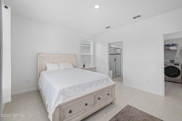 102 Fairlake Cir, Saint Augustine, FL 32092 - bedroom featuring washer / clothes dryer, baseboards, visible vents, and light tile patterned floors