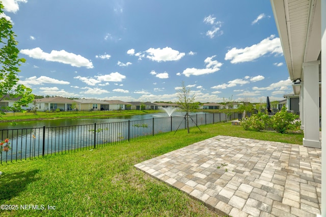 102 Fairlake Cir, Saint Augustine, FL 32092 - view of yard featuring a water view, a residential view, a patio, and a fenced backyard