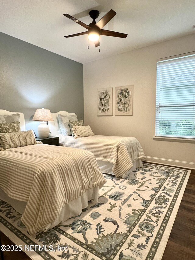 2714 Las Calinas Blvd, Saint Augustine, FL 32095 - bedroom with baseboards, wood finished floors, and a ceiling fan