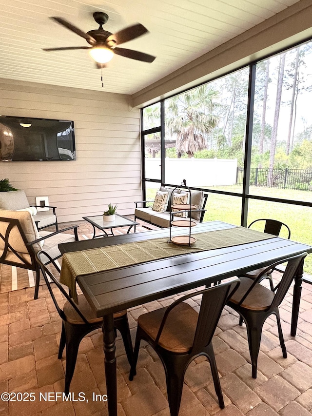 2714 Las Calinas Blvd, Saint Augustine, FL 32095 - sunroom featuring ceiling fan and outdoor dining space