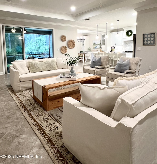 2714 Las Calinas Blvd, Saint Augustine, FL 32095 - living area featuring visible vents, crown molding, recessed lighting, and a raised ceiling