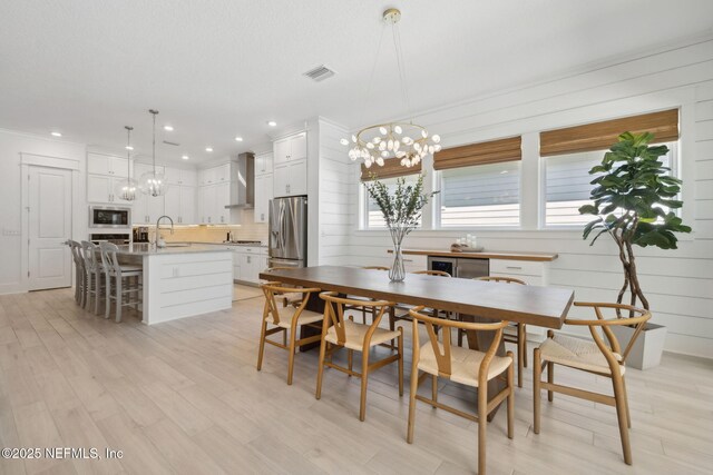 280 Quail Vista Dr, Ponte Vedra, FL 32081 - dining space with visible vents, recessed lighting, a chandelier, and light wood-style floors