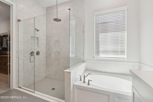 280 Quail Vista Dr, Ponte Vedra, FL 32081 - full bathroom featuring a shower stall, vanity, a garden tub, and a healthy amount of sunlight