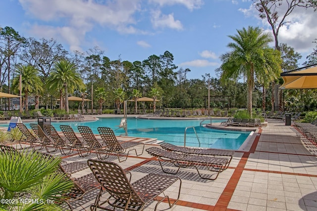 280 Quail Vista Dr, Ponte Vedra, FL 32081 - community pool featuring a patio area and fence