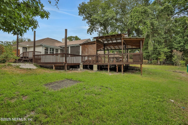 12847 Swamp Owl Ln, Jacksonville, FL 32258 - view of grassy yard with a wooden deck