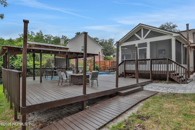 12847 Swamp Owl Ln, Jacksonville, FL 32258 - wooden deck with a sunroom and fence