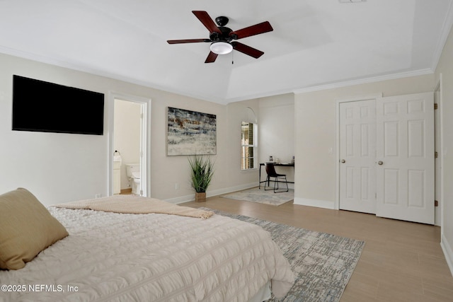 12847 Swamp Owl Ln, Jacksonville, FL 32258 - bedroom featuring baseboards, connected bathroom, crown molding, and a ceiling fan